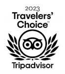 Tripadvisor Travelers' Choice 2023 Auszeichnung. Tripadvisor Logo-Eule in einem Lorbeerkranz